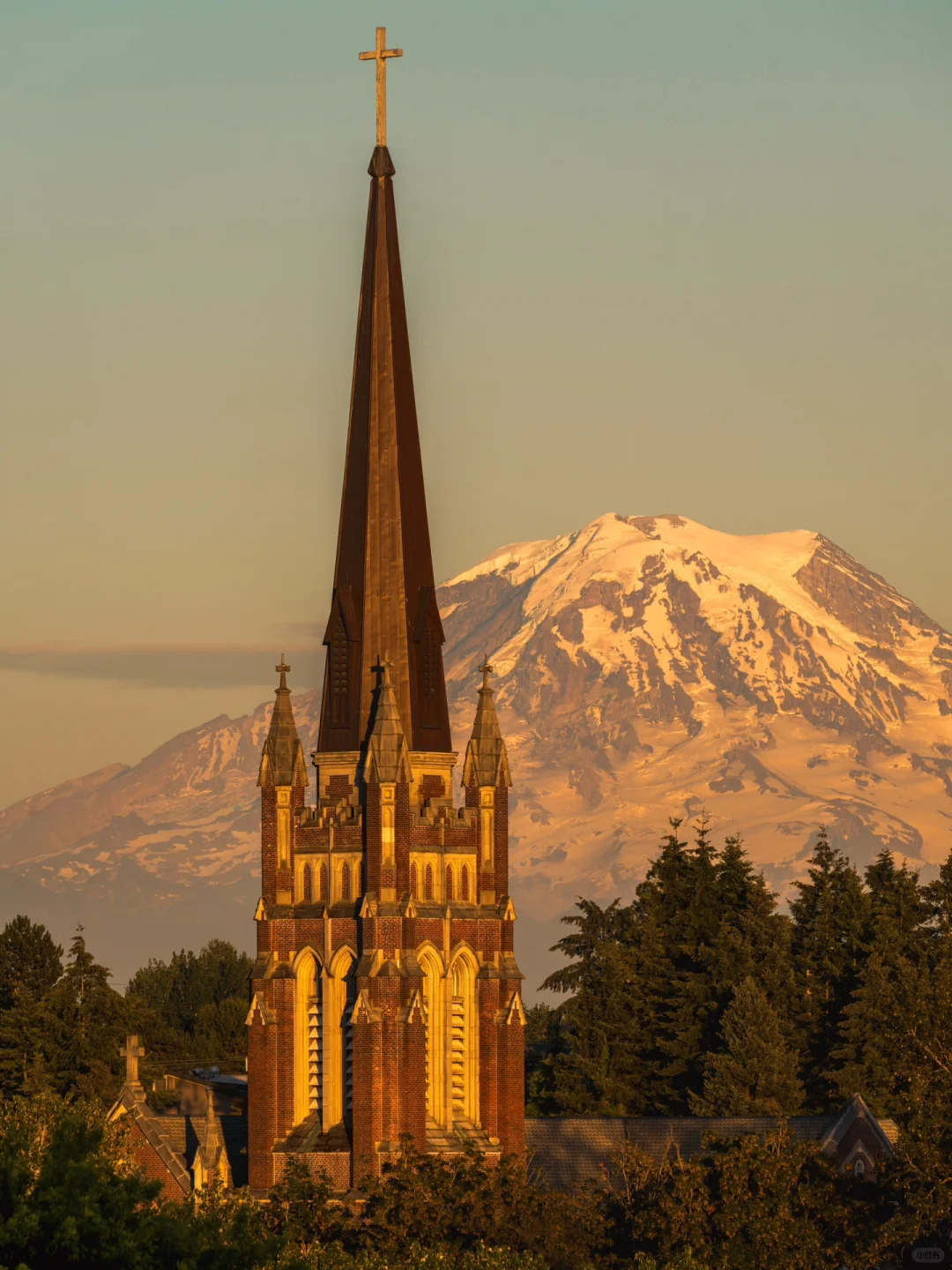 Sunset over Rainier with a church backdrop is absolutely stunning!