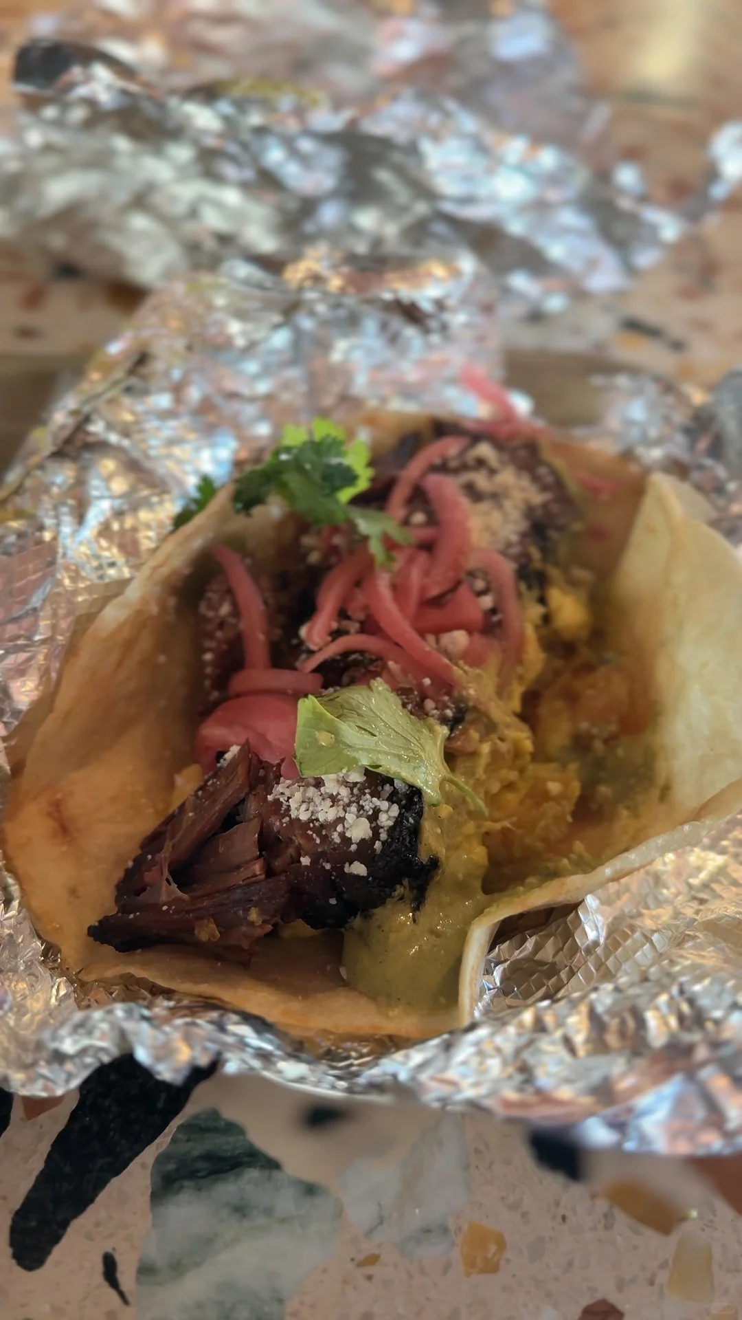 牛腩早餐塔可" (Niú nǎn zǎocān tǎ kě)